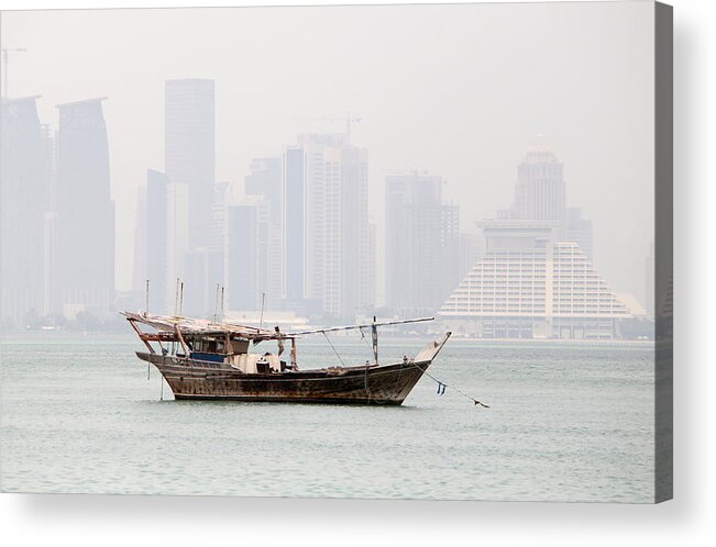 Dhow Acrylic Print featuring the photograph Fishing dhow and misty towers by Paul Cowan