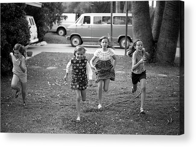 Racing Acrylic Print featuring the photograph Four Girls Racing, 1972 by Jeremy Butler