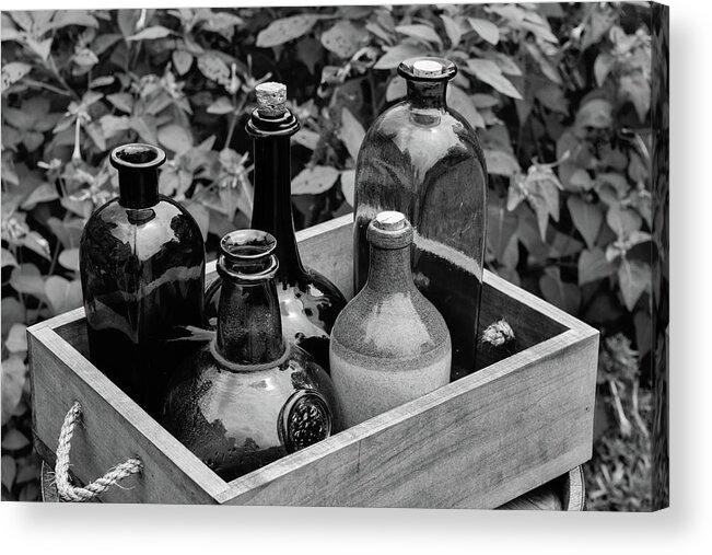 Antique Acrylic Print featuring the photograph Glass Bottles in the Garden by Nicole Lloyd