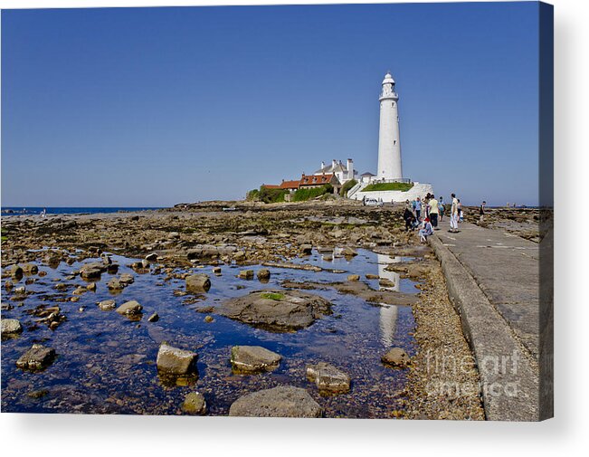Lighthouse Acrylic Print featuring the photograph Lighthouse at low tide. by Elena Perelman