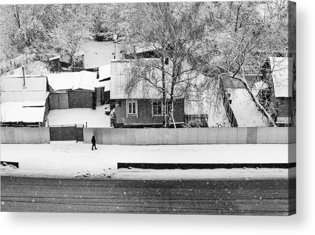 Lone Acrylic Print featuring the photograph Lone Walker and the Snow Fall Village by John Williams