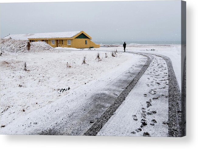 Iceland Acrylic Print featuring the photograph Man walking in snow Iceland by Michalakis Ppalis