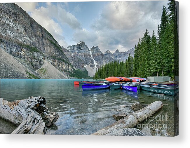 Moraine Lake Acrylic Print featuring the photograph Moraine logs and canoes by Paul Quinn