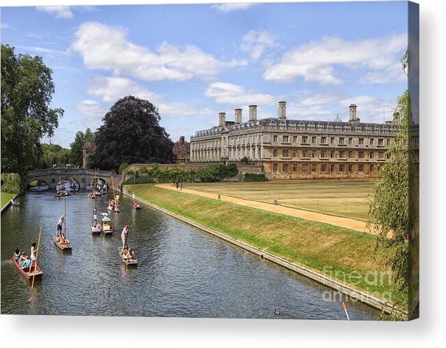 Punting Acrylic Print featuring the photograph Punter boats passing King's college in Cambridge by Patricia Hofmeester