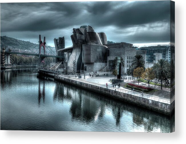 Spain Bilbao Guggenheim Museum Basque Country Frank Gehry Contemporary Architecture Nervion River City Daring And Innovative Curves Building Exterior Spectacular Building Deconstructivism Ferrovial Clad In Glass Acrylic Print featuring the photograph The Guggenheim Museum Bilbao Surreal by Andy Myatt