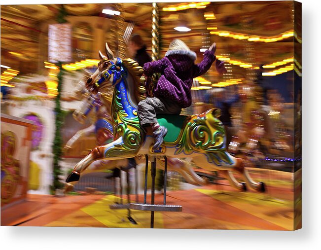 Child Enjoying Merry-go-round Carousel At Christmas Fairground And Market Acrylic Print featuring the photograph 1161-4099 by Robert Harding Picture Library