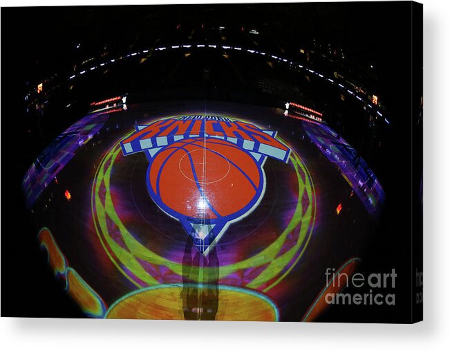 A Photo Of The New York Knicks Logo Before A Game Against The Sacramento Kings On December 4 Acrylic Print featuring the photograph Sacramento Kings V New York Knicks by Nathaniel S. Butler