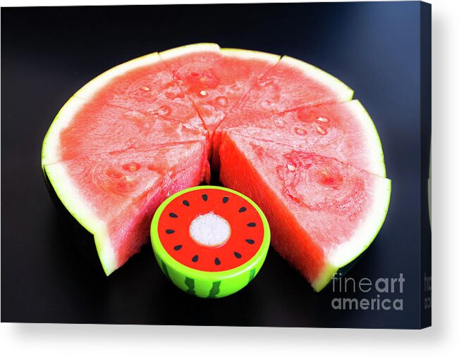 Backdrop Acrylic Print featuring the photograph A large slice of watermelon divided into smaller pieces next to by Joaquin Corbalan