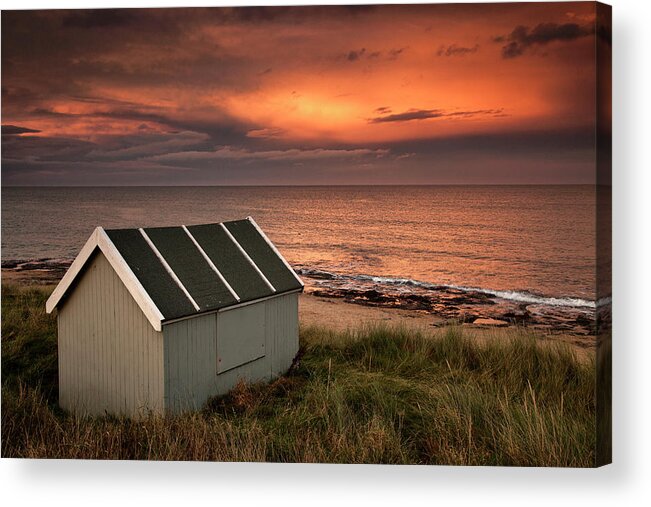 Water's Edge Acrylic Print featuring the photograph A Small Building On The Waters Edge At by John Short / Design Pics