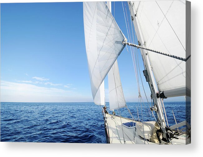 Eco Tourism Acrylic Print featuring the photograph A Yacht Sailing In The Open Sea On A by Nikitje