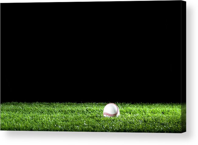 Softball Acrylic Print featuring the photograph Baseball In The Grass At Night by Courtneyk