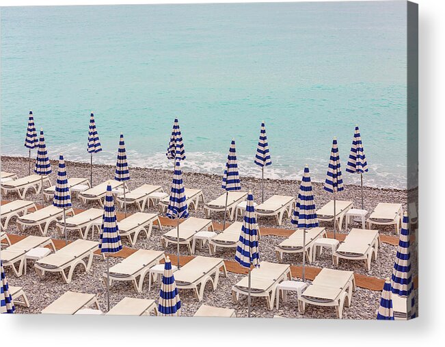 Beach Umbrellas In Nice Acrylic Print featuring the photograph Beach Umbrellas in Nice by Melanie Alexandra Price