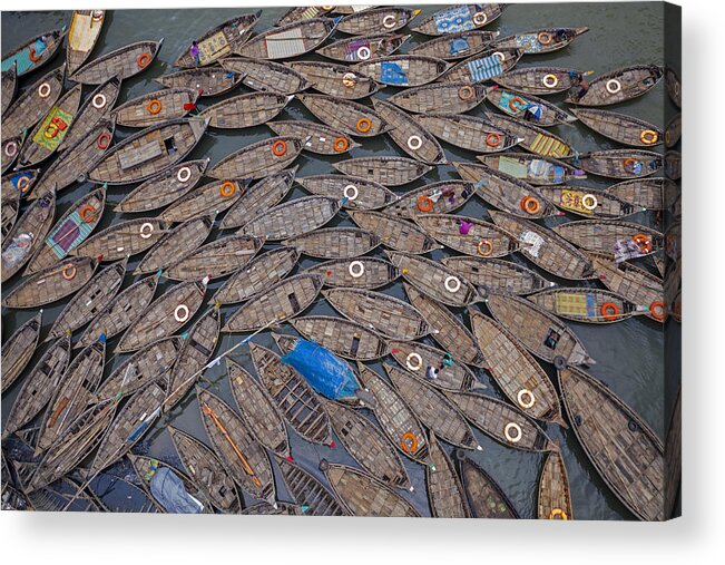 Wooden Acrylic Print featuring the photograph Boats Laid Out Like Petals With Life Saving Rings by Azim Khan Ronnie