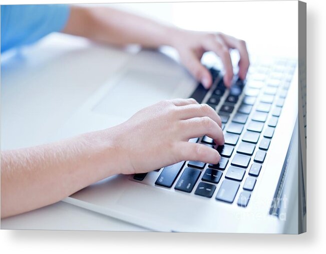Boy Acrylic Print featuring the photograph Boy Using Laptop Keyboard by Science Photo Library