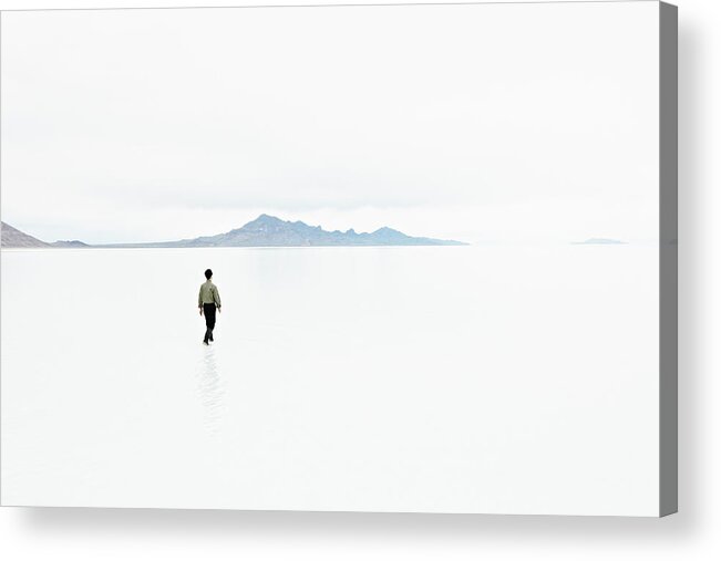 Scenics Acrylic Print featuring the photograph Businessman In Shallow Water In by Thomas Barwick
