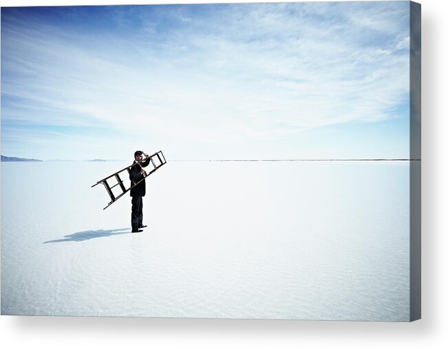 Scenics Acrylic Print featuring the photograph Businessman Standing In Water Holding by Thomas Barwick