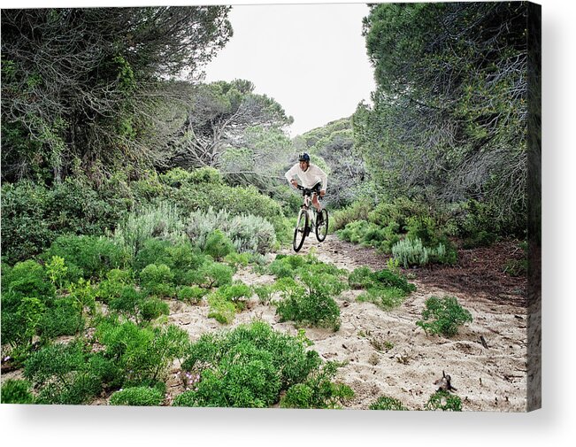 Sports Helmet Acrylic Print featuring the photograph Cycling Over Rugged Terrain by Ben Welsh / Design Pics