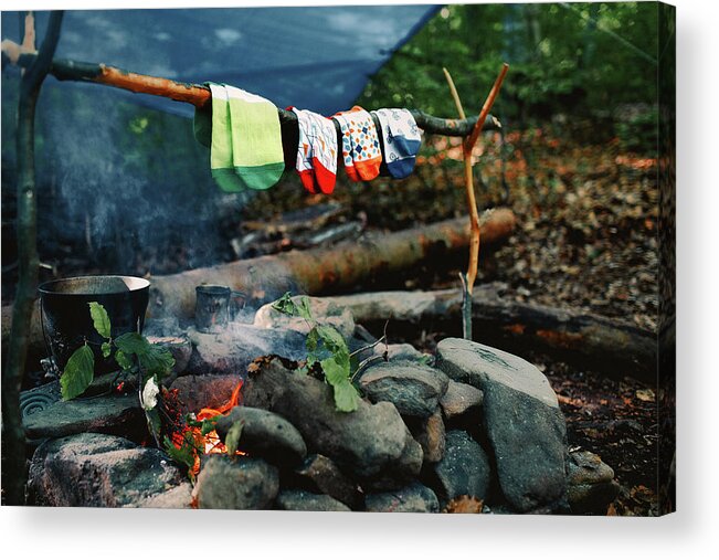 Fire Acrylic Print featuring the photograph Drying Wet Socks On The Bonfire During Camping. Socks Drying On Fire. Active Rest In Forest. by Cavan Images