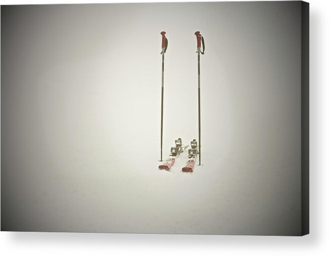 Ski Pole Acrylic Print featuring the photograph Empty Skis And Poles In Snow by Ross Woodhall