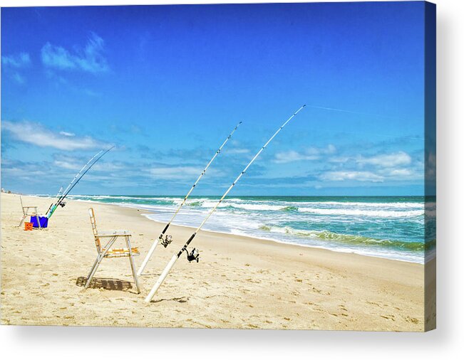 Fishing Poles On A Beach Acrylic Print by Kayla Stevenson