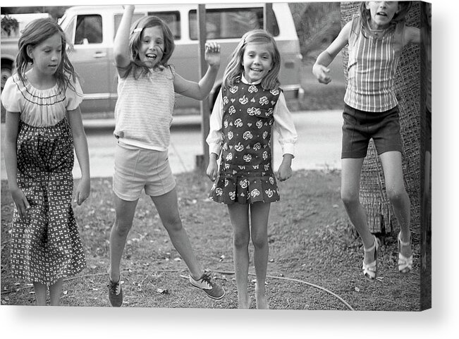 Jumping Acrylic Print featuring the photograph Four Girls, Jumping, 1972 by Jeremy Butler
