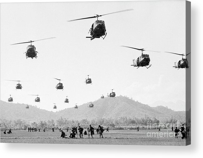 Wind Acrylic Print featuring the photograph Helicopters Landing In Vietnam by Bettmann