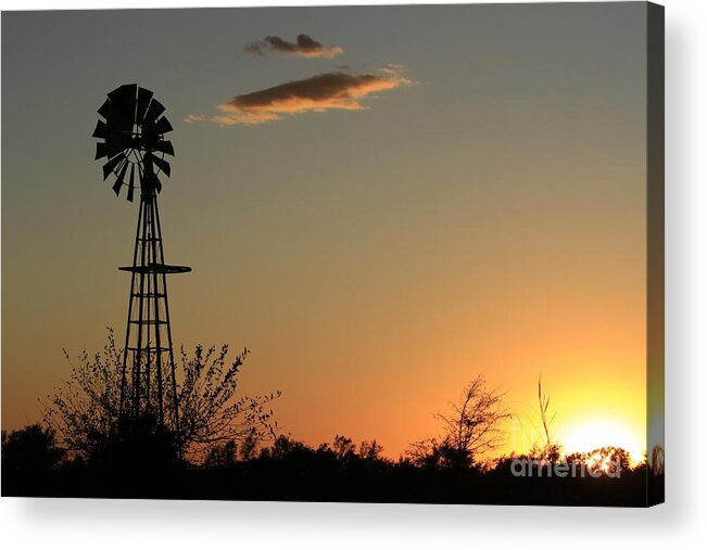 Windmill Acrylic Print featuring the digital art Kansas Windmill silhouette in a Pasture with a colorful Sunset. by Robert D Brozek