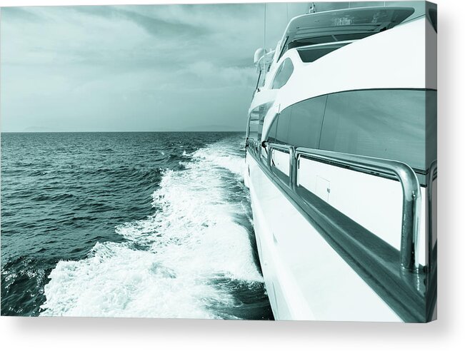 Desaturated Acrylic Print featuring the photograph Luxury Yacht Sailing At Sea. Blue Toned by Petreplesea