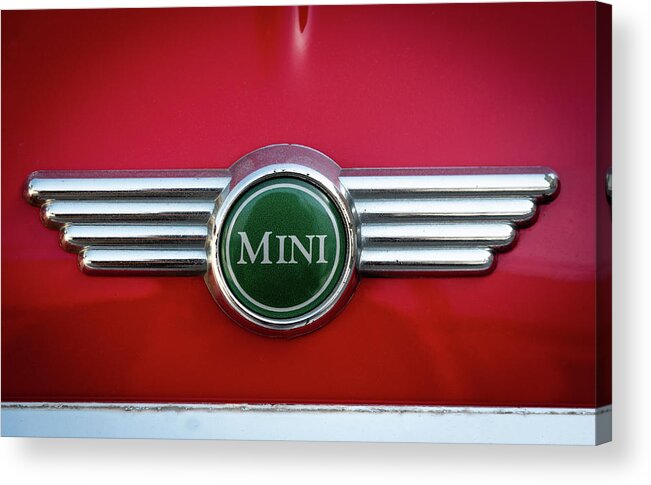 Mini Acrylic Print featuring the photograph Mini Cooper car logo on red surface by Michalakis Ppalis