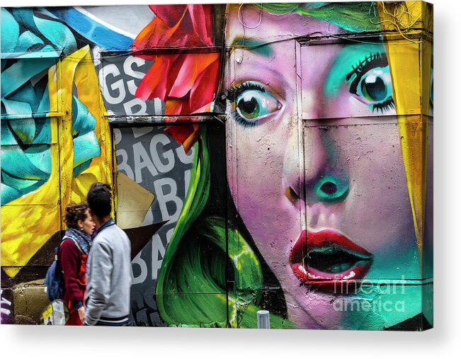 Art Acrylic Print featuring the photograph People Walking Past Graffiti Face by Tim Bird