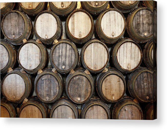 Alcohol Acrylic Print featuring the photograph Stacked Oak Barrels In A Winery by Marc Volk