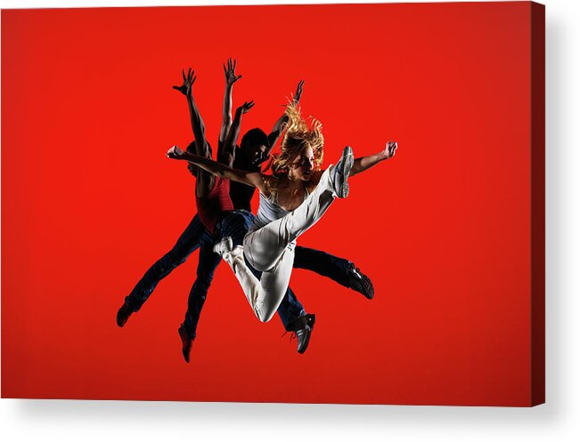 Ballet Dancer Acrylic Print featuring the photograph Three Dancers Leaping On Stage by Thomas Barwick
