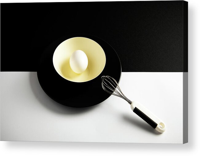 Egg Acrylic Print featuring the photograph White egg on a yellow bowl. by Michalakis Ppalis
