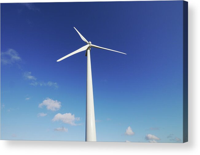 Outdoors Acrylic Print featuring the photograph Wind Turbine Against Blue Sky by Tom Bonaventure