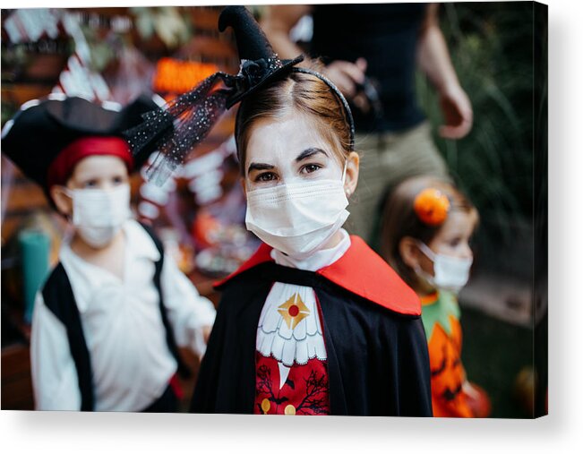 Season Acrylic Print featuring the photograph Little kids at a Halloween party #1 by Anchiy