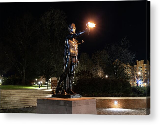 University Of Tennessee At Night Acrylic Print featuring the photograph Torchbearer statue at the University of Tennessee at night by Eldon McGraw