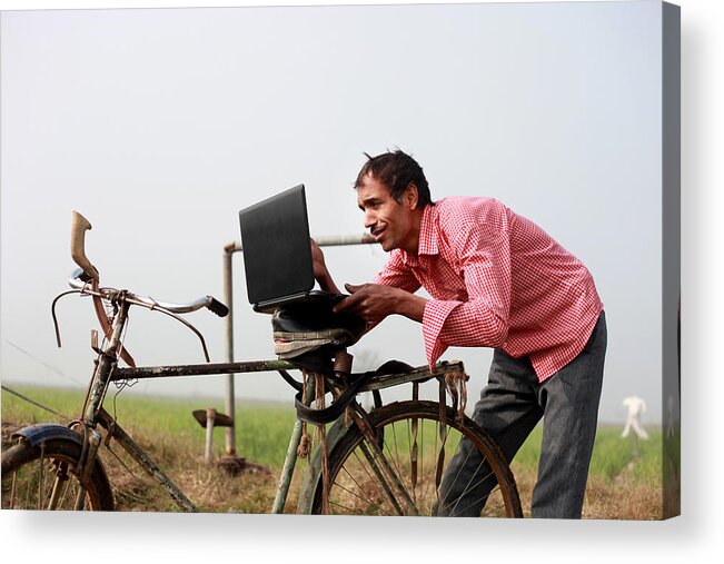 Farm Worker Acrylic Print featuring the photograph Farmer using laptop in the field #2 by Pixelfusion3d