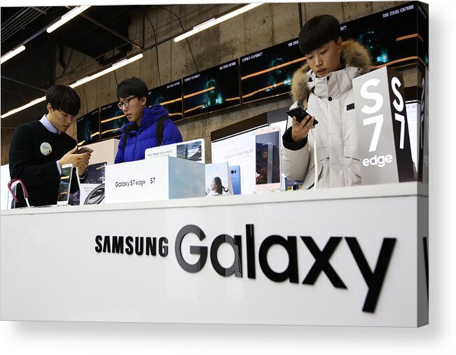 People Acrylic Print featuring the photograph Inside Samsung Electronics Stores Ahead Of 4Q Results by Bloomberg