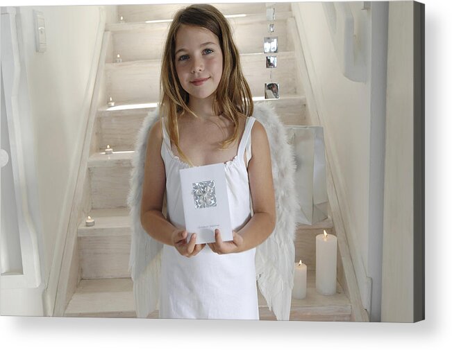 Event Acrylic Print featuring the photograph Little girl in an angel costume, holding a Christmas card, indoors #2 by Pascal Broze