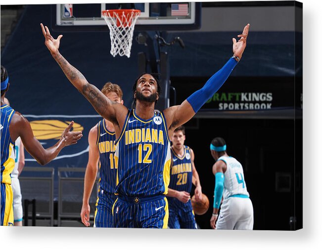 Oshae Brissett Acrylic Print featuring the photograph Play-In Tournament - Charlotte Hornets v Indiana Pacers #2 by Ron Hoskins