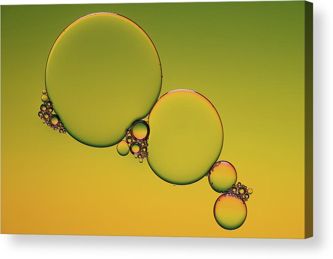 Connection Acrylic Print featuring the photograph Bright abstract, yellow background with flying bubbles by Michalakis Ppalis