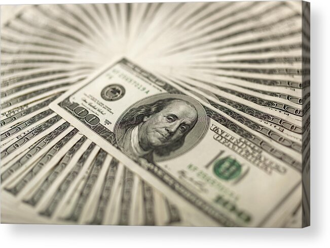 Fanned Out Acrylic Print featuring the photograph A fan of hundred dollar bills by Roger Spooner