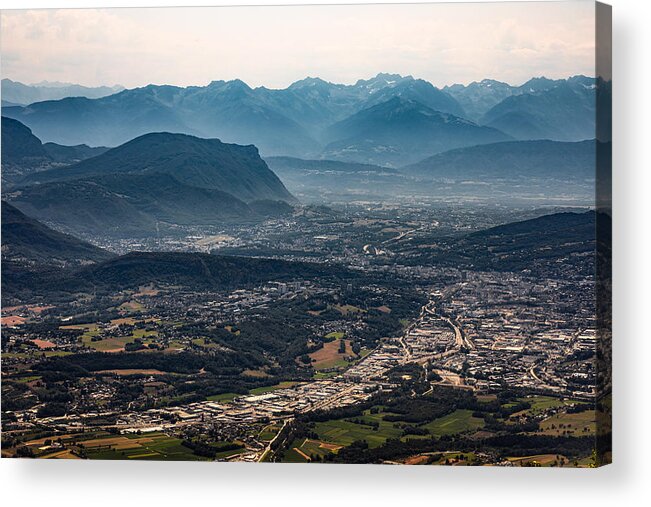Scenics Acrylic Print featuring the photograph Aerial view on the French city of Chambery and its surroundings at dusk with mist between the Alps mountains by Gregory_DUBUS
