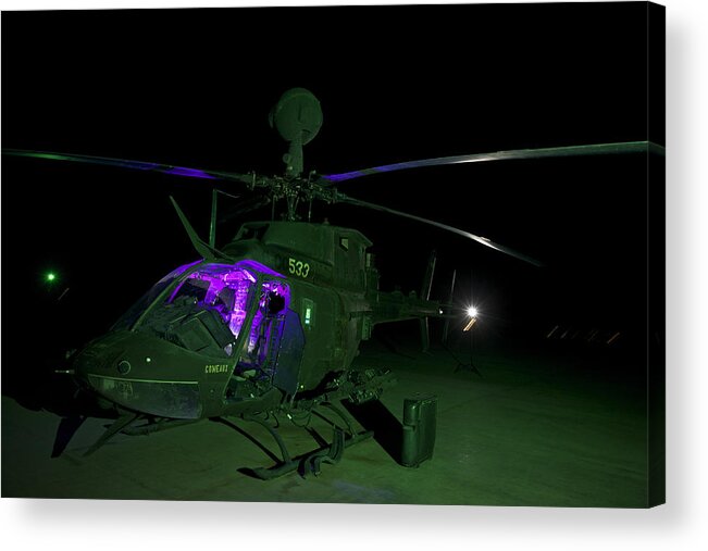 Camp Speicher Acrylic Print featuring the photograph An OH-58D Kiowa helicopter at COB Speicher, Tikrit, Iraq, during Operation Iraqi Freedom. by Terry Moore/Stocktrek Images