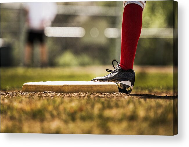 Children Only Acrylic Print featuring the photograph Baseball player touching base by Sollina Images