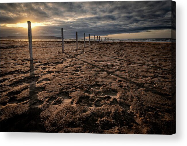 Downhill Acrylic Print featuring the photograph Benone Beach Posts by Nigel R Bell