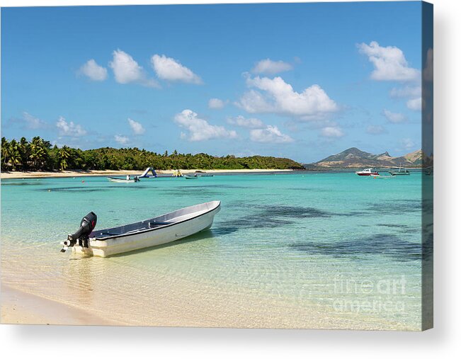 Fiji Acrylic Print featuring the photograph Boat on a white sand beach in the Blue lagoon island in the Yasa by Didier Marti