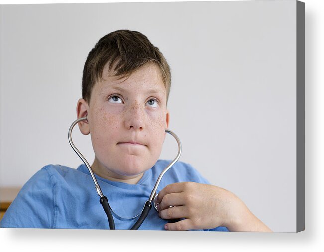 Child Acrylic Print featuring the photograph Boy using a stethoscope by Gombert, Sigrid/science Photo Library