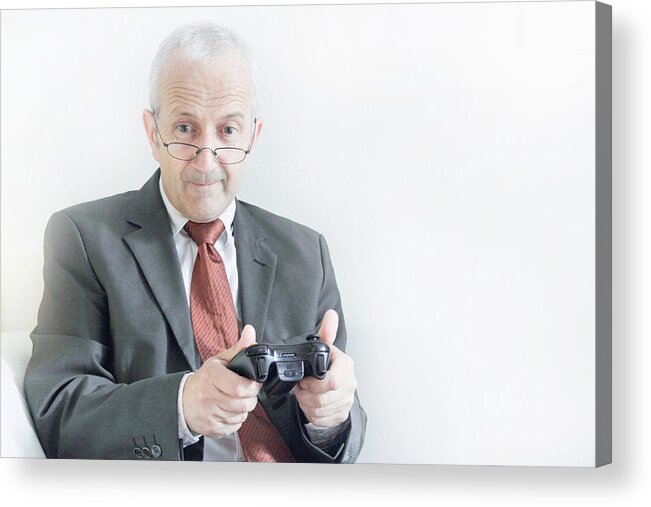 Technology Acrylic Print featuring the photograph Businessman playing video games by Sigrid Gombert