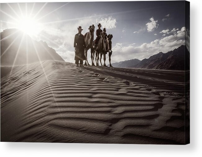 India Acrylic Print featuring the photograph Camel riders on the crest of a sand dune in the Nubra Valley by Murray Rudd